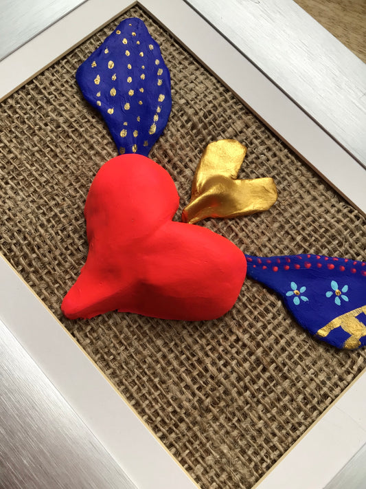 One of a kind: Handcrafted flying heart