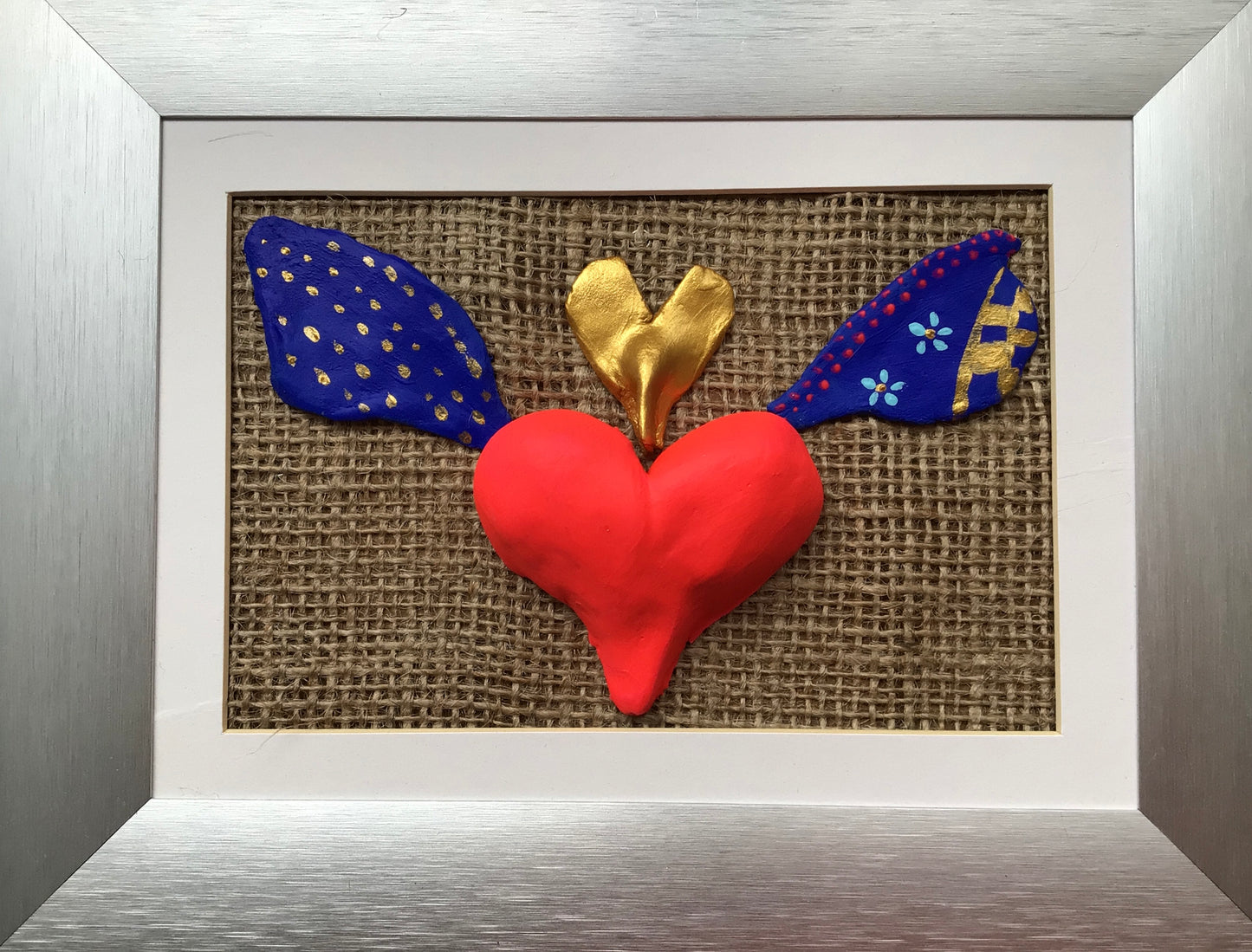 One of a kind: Handcrafted flying heart